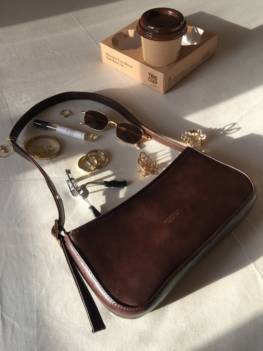 TOKEN LEATHER BAG