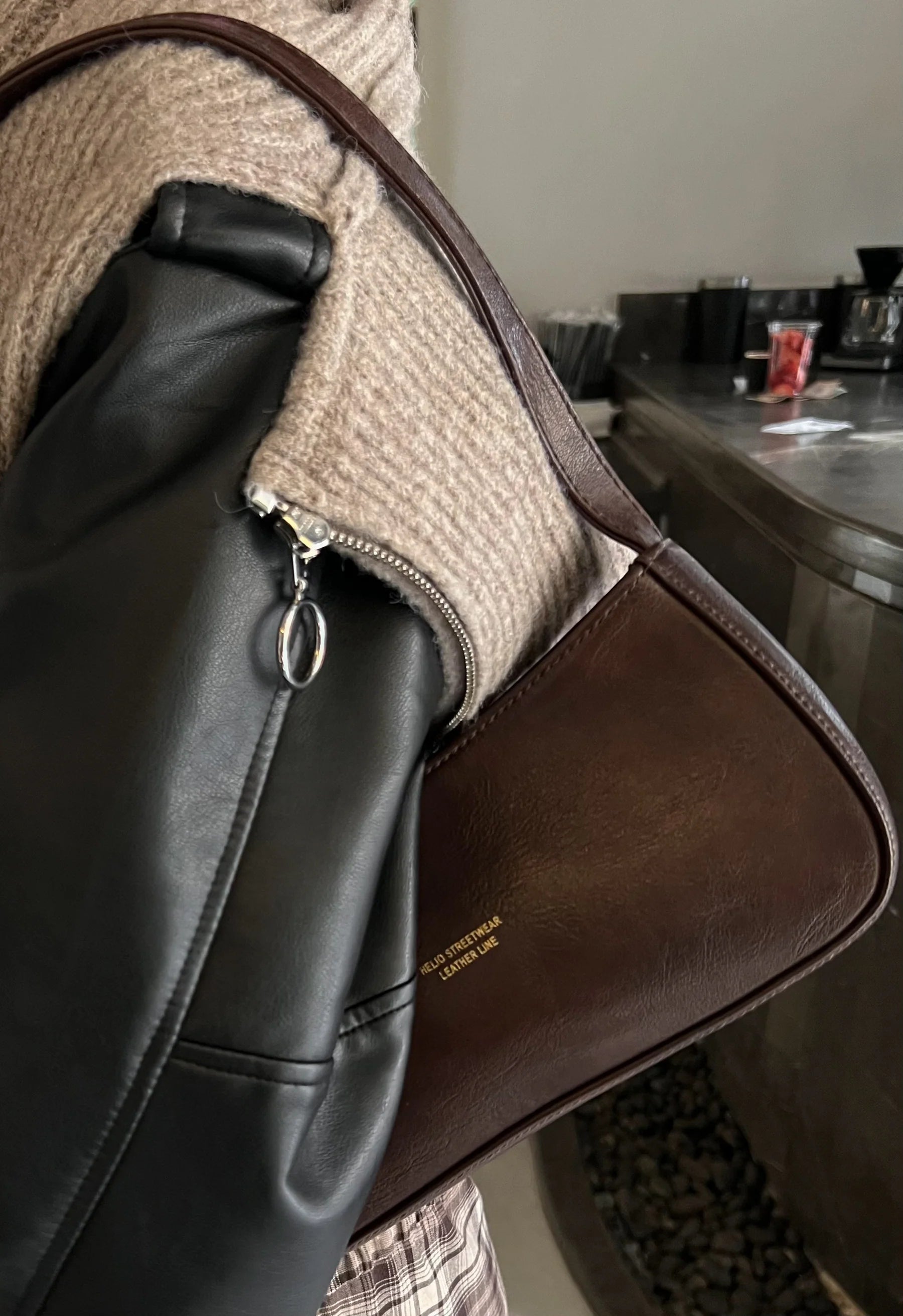 TOKEN LEATHER BAG